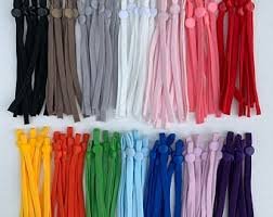White Adjustable Elastics Per Pair